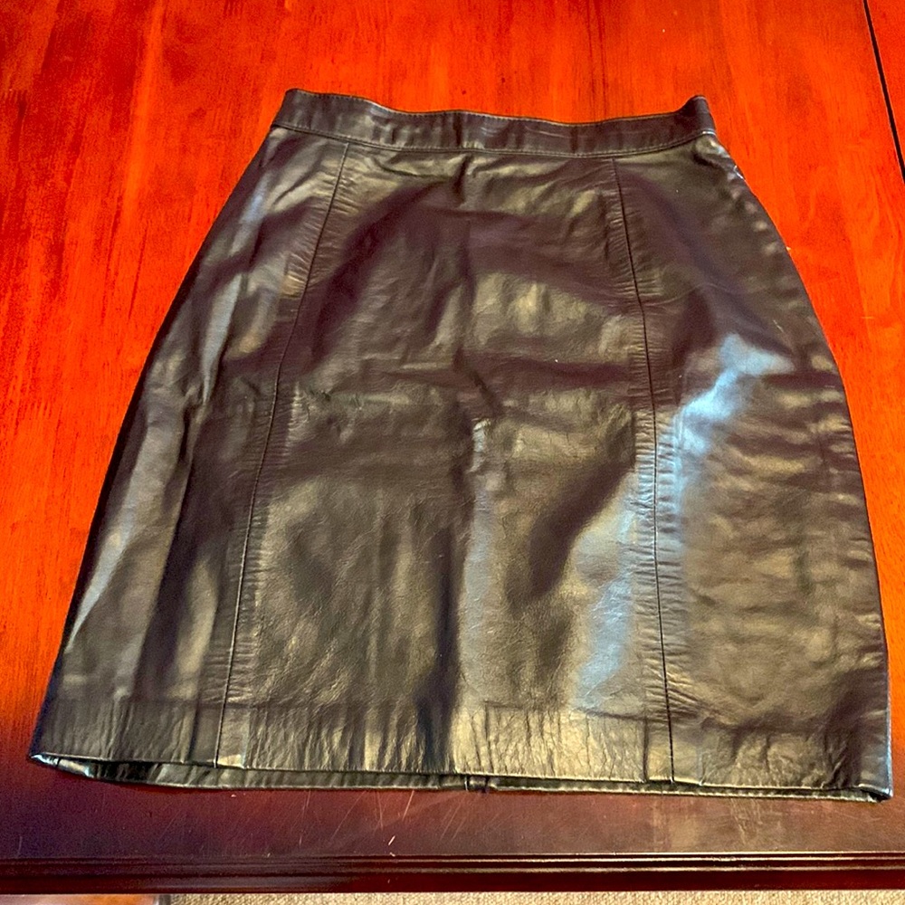 Black genuine leather mini skirt- 24inch waist and 17.5 inches long